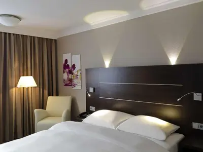 Ein Bett oder Betten in einem Zimmer der Unterkunft Mercure Hotel Hagen