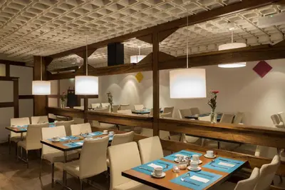 Ein Restaurant oder anderes Speiselokal in der Unterkunft Days Inn Dortmund West