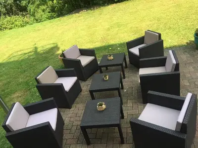 Ein Sitzbereich in der Unterkunft Hotel Barbarossa