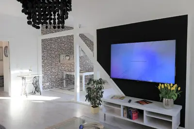 TV/Unterhaltungsangebot in der Unterkunft Ferienwohnung Villa Ruhr