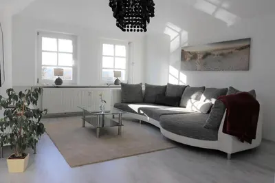 Ein Sitzbereich in der Unterkunft Ferienwohnung Villa Ruhr
