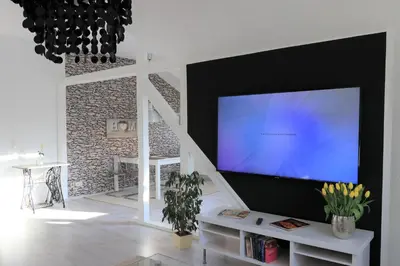 TV/Unterhaltungsangebot in der Unterkunft Ferienwohnung Villa Ruhr
