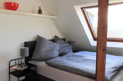 Ein Bett oder Betten in einem Zimmer der Unterkunft Ferienwohnung Villa Ruhr