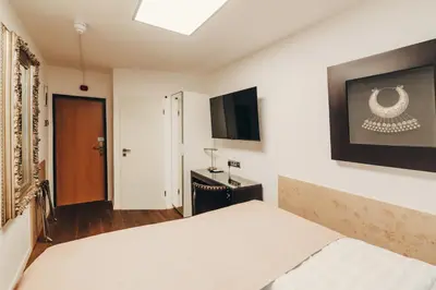 Ein Bett oder Betten in einem Zimmer der Unterkunft Boutique Hotel Düsseldorf Berial
