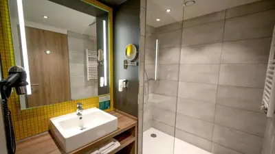 Ein Badezimmer in der Unterkunft Holiday Inn Ratingen - City by IHG