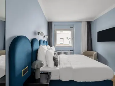 Ein Bett oder Betten in einem Zimmer der Unterkunft Numa Düsseldorf Artol