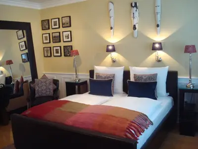 Ein Bett oder Betten in einem Zimmer der Unterkunft Boutique Hotel Sir & Lady Astor - The Charming City Hotels