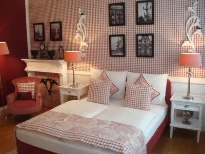 Ein Bett oder Betten in einem Zimmer der Unterkunft Boutique Hotel Sir & Lady Astor - The Charming City Hotels