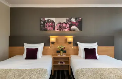 Ein Bett oder Betten in einem Zimmer der Unterkunft Leonardo Hotel Düsseldorf Airport Ratingen