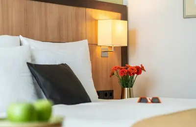 Ein Bett oder Betten in einem Zimmer der Unterkunft Leonardo Hotel Düsseldorf Airport Ratingen