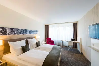 Ein Bett oder Betten in einem Zimmer der Unterkunft Best Western Plus Parkhotel Velbert