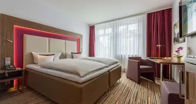 Ein Bett oder Betten in einem Zimmer der Unterkunft Best Western Plus Hotel Stadtquartier Haan
