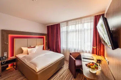 Ein Bett oder Betten in einem Zimmer der Unterkunft Best Western Plus Hotel Stadtquartier Haan