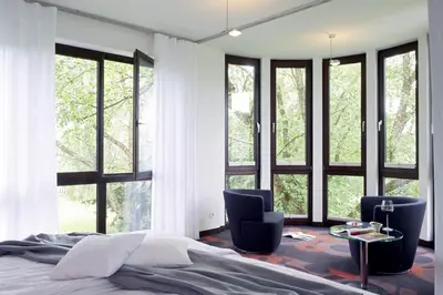 Ein Bett oder Betten in einem Zimmer der Unterkunft Mintrops Land Hotel Burgaltendorf