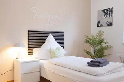 Ein Bett oder Betten in einem Zimmer der Unterkunft Apartment mit Wohnflair