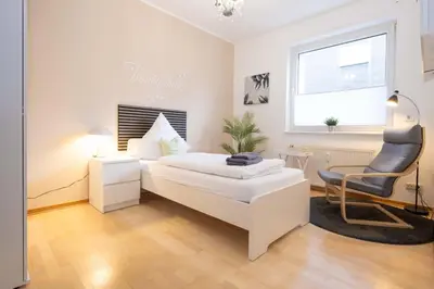 Ein Bett oder Betten in einem Zimmer der Unterkunft Apartment mit Wohnflair