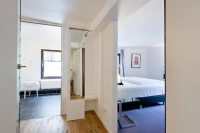 Ein Bett oder Betten in einem Zimmer der Unterkunft Pension Café Eisgold