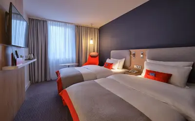 Ein Bett oder Betten in einem Zimmer der Unterkunft Holiday Inn Express Düsseldorf - City North by IHG