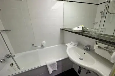 Ein Badezimmer in der Unterkunft Hotel Bredeney