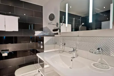 Ein Badezimmer in der Unterkunft Wyndham Duisburger Hof