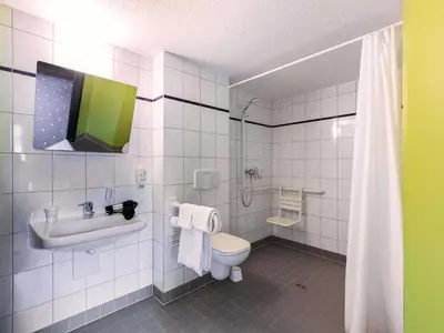Ein Badezimmer in der Unterkunft B&B Hotel Bochum-Herne