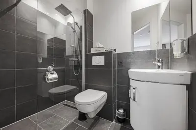 Ein Badezimmer in der Unterkunft Hotel Alte Redaktion