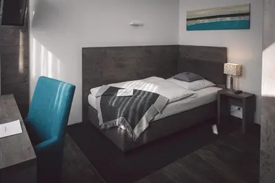 Ein Bett oder Betten in einem Zimmer der Unterkunft Hotel Alte Redaktion
