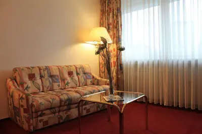 Ein Sitzbereich in der Unterkunft City Hotel Essen