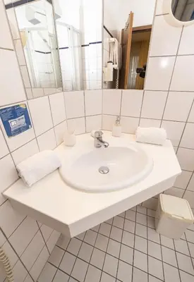 Ein Badezimmer in der Unterkunft Hotel am Schlosspark Essen