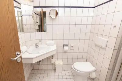 Ein Badezimmer in der Unterkunft Hotel am Schlosspark Essen