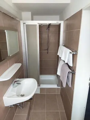 Ein Badezimmer in der Unterkunft Hotel Berliner Hof