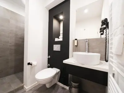 Ein Badezimmer in der Unterkunft JustStay Solingen Hotel & Apartments