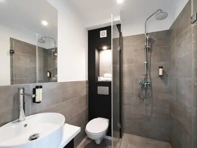 Ein Badezimmer in der Unterkunft JustStay Solingen Hotel & Apartments