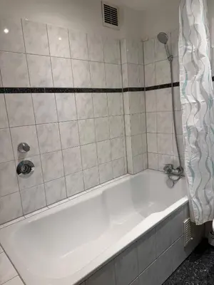 Ein Badezimmer in der Unterkunft Graf-Adolflux