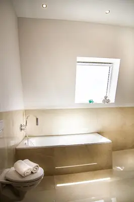 Ein Badezimmer in der Unterkunft Sleep Inn Wehrhahn Suites