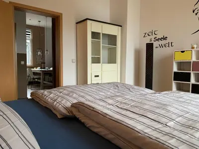 Ein Bett oder Betten in einem Zimmer der Unterkunft Stadthaus Artur - Apartment Barcelona