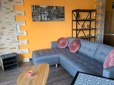 Ein Sitzbereich in der Unterkunft Stadtvilla Intzeplatz - Apartment Föhr
