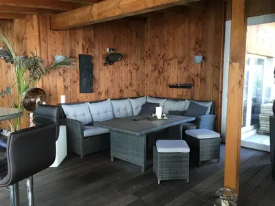 Ein Sitzbereich in der Unterkunft Stadtvilla Intzeplatz - Apartment Föhr