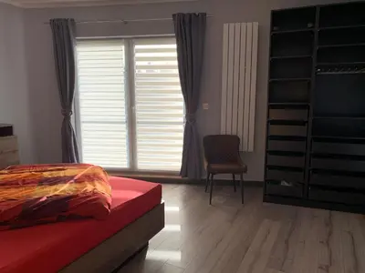 Ein Bett oder Betten in einem Zimmer der Unterkunft Stadtvilla Intzeplatz - Apartment Föhr