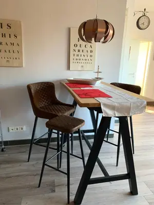 Ein Sitzbereich in der Unterkunft Stadtvilla Intzeplatz - Apartment Föhr