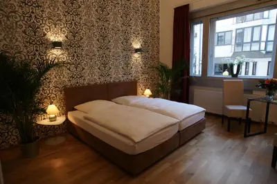 Ein Bett oder Betten in einem Zimmer der Unterkunft Hotel Stern - Self Check-In