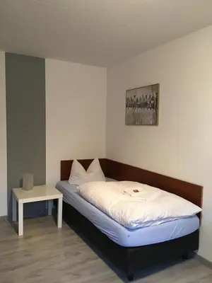 Ein Bett oder Betten in einem Zimmer der Unterkunft Hubertus-Hof