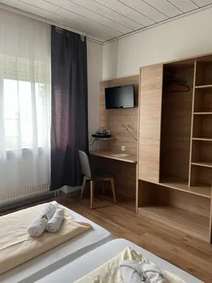 Ein Bett oder Betten in einem Zimmer der Unterkunft Hubertus-Hof