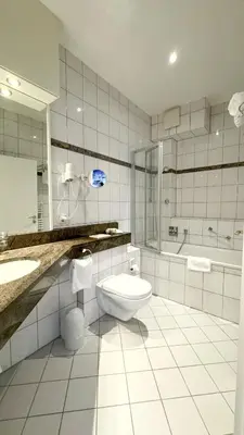 Ein Badezimmer in der Unterkunft Hotel Haus Gimken