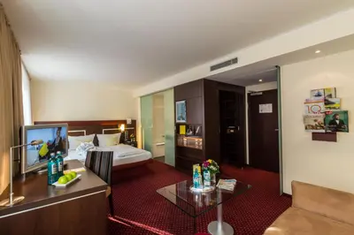Ein Bett oder Betten in einem Zimmer der Unterkunft Ringhotel Drees