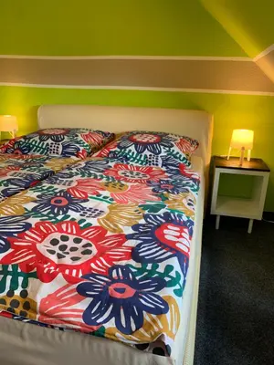 Ein Bett oder Betten in einem Zimmer der Unterkunft Hotel Zur Schleuse (Garni)