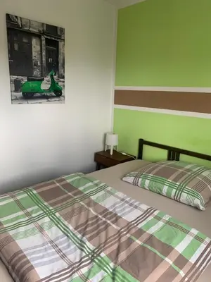 Ein Bett oder Betten in einem Zimmer der Unterkunft Hotel Zur Schleuse (Garni)
