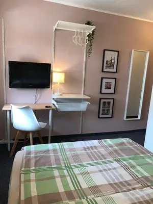 Ein Bett oder Betten in einem Zimmer der Unterkunft Hotel Zur Schleuse (Garni)
