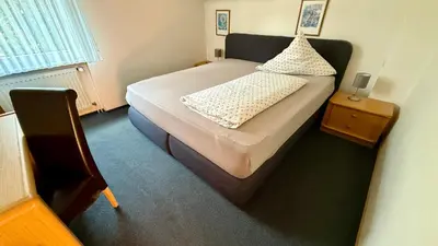 Ein Bett oder Betten in einem Zimmer der Unterkunft Hotel am Schloss Borbeck