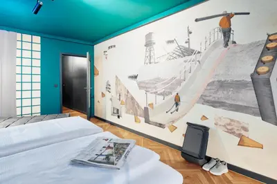 Ein Bett oder Betten in einem Zimmer der Unterkunft art Hotel Tucholsky